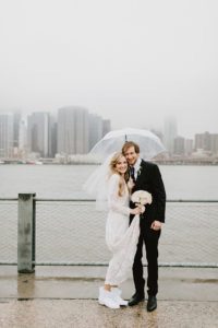 Rainy day wedding couple NYC