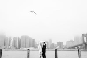 Rainy day wedding couple NYC
