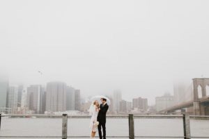 Rainy day wedding couple NYC