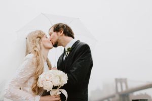 NYC rainy day bride and groom