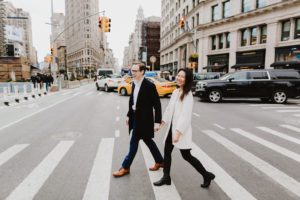 Flatiron engaged couple walking