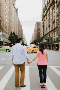 NYC couple holding hands