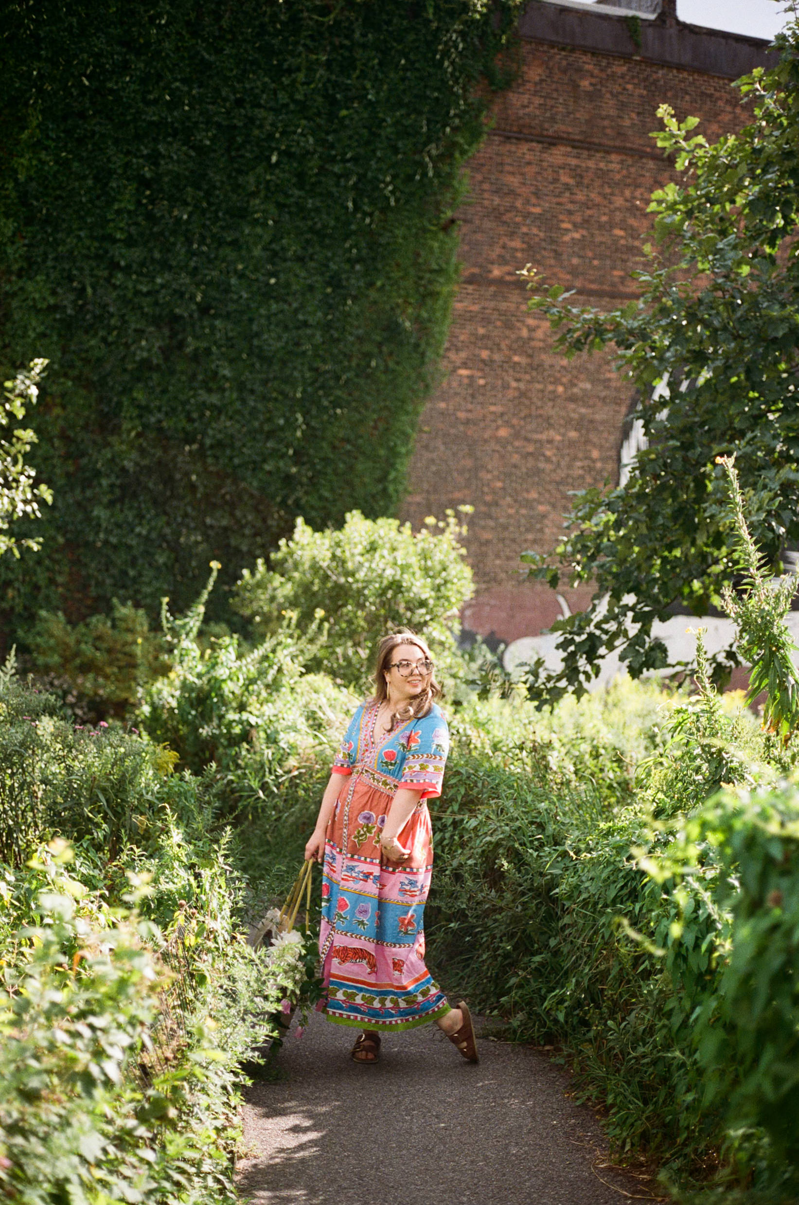 a girl in a garden in NYC