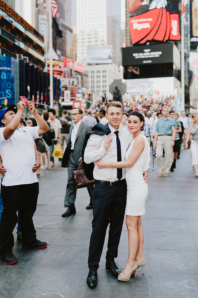 a man and a woman after their elopement in time square NYC