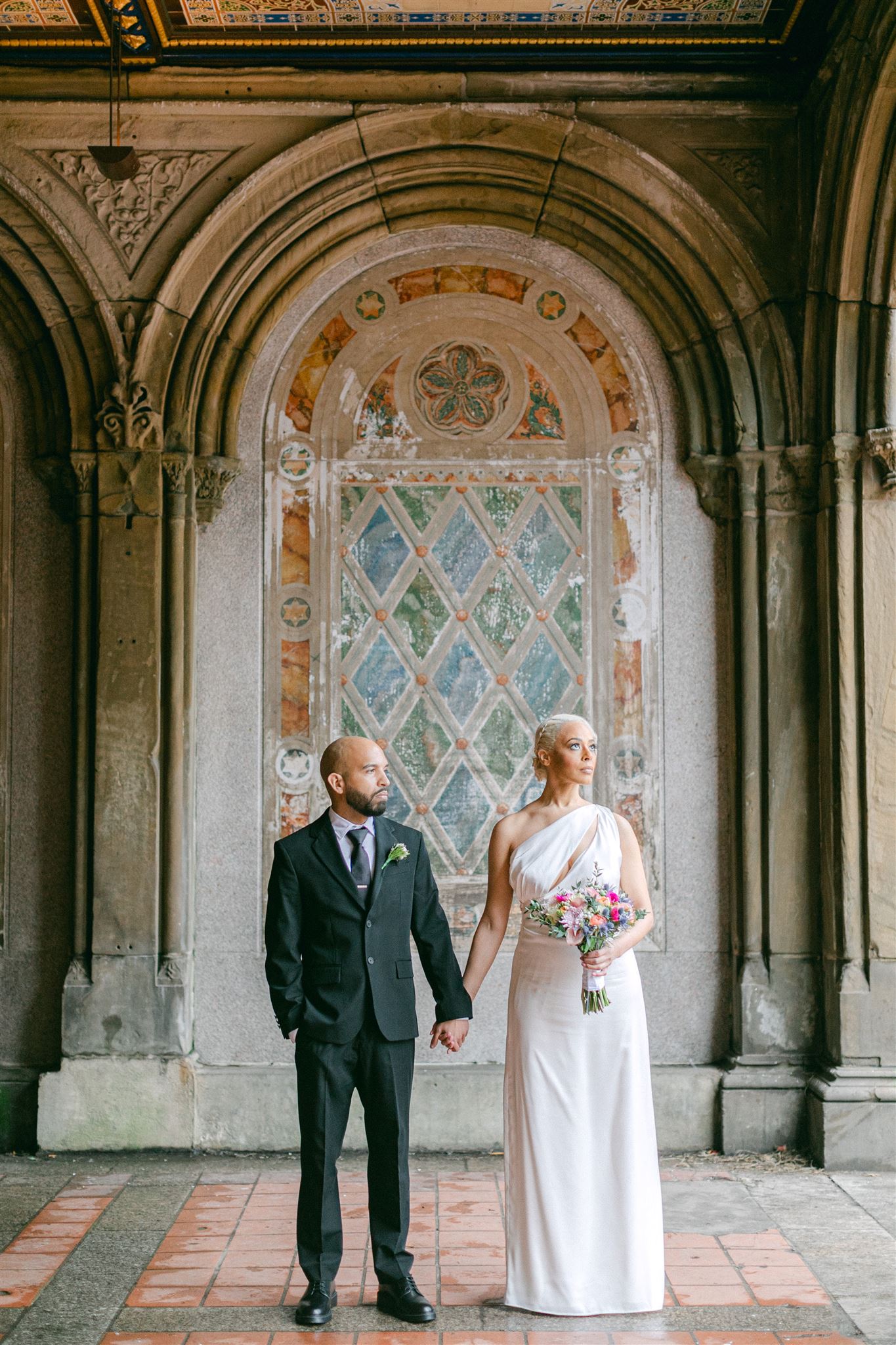 bride and groom portraits at bethesda terrace in NYC
