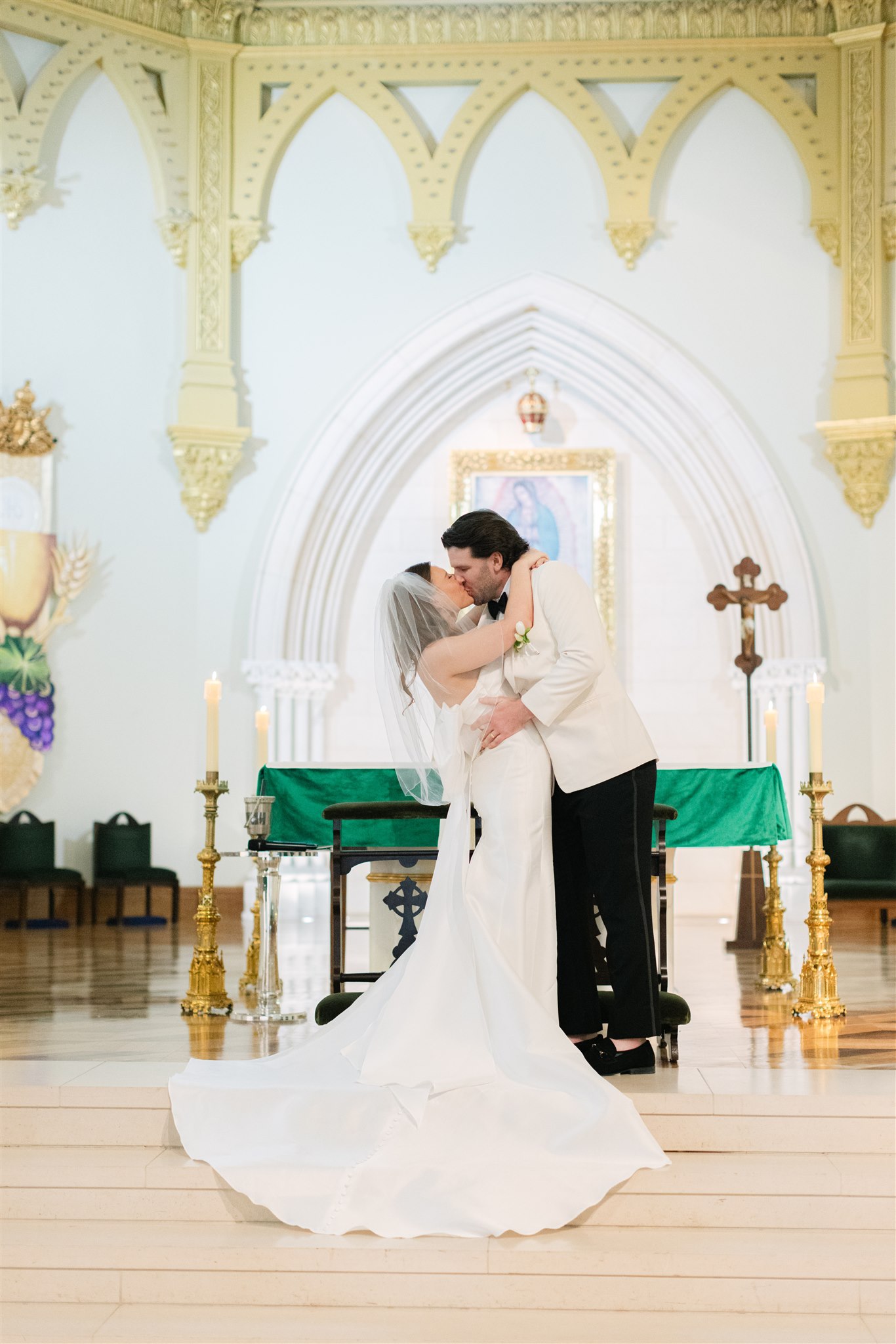 bride and groom first kiss as husband and wife