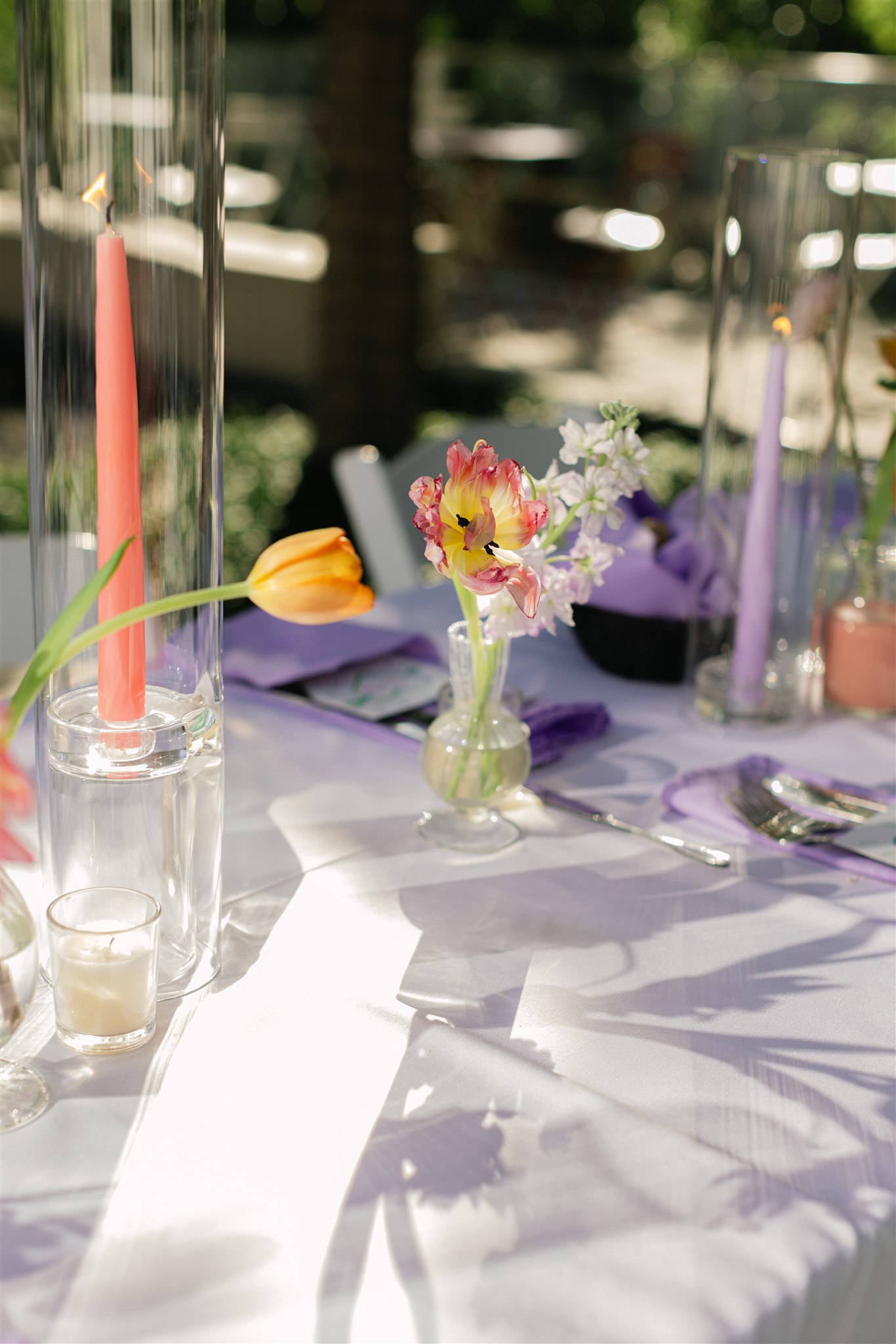 colorful bud vases for a wedding reception