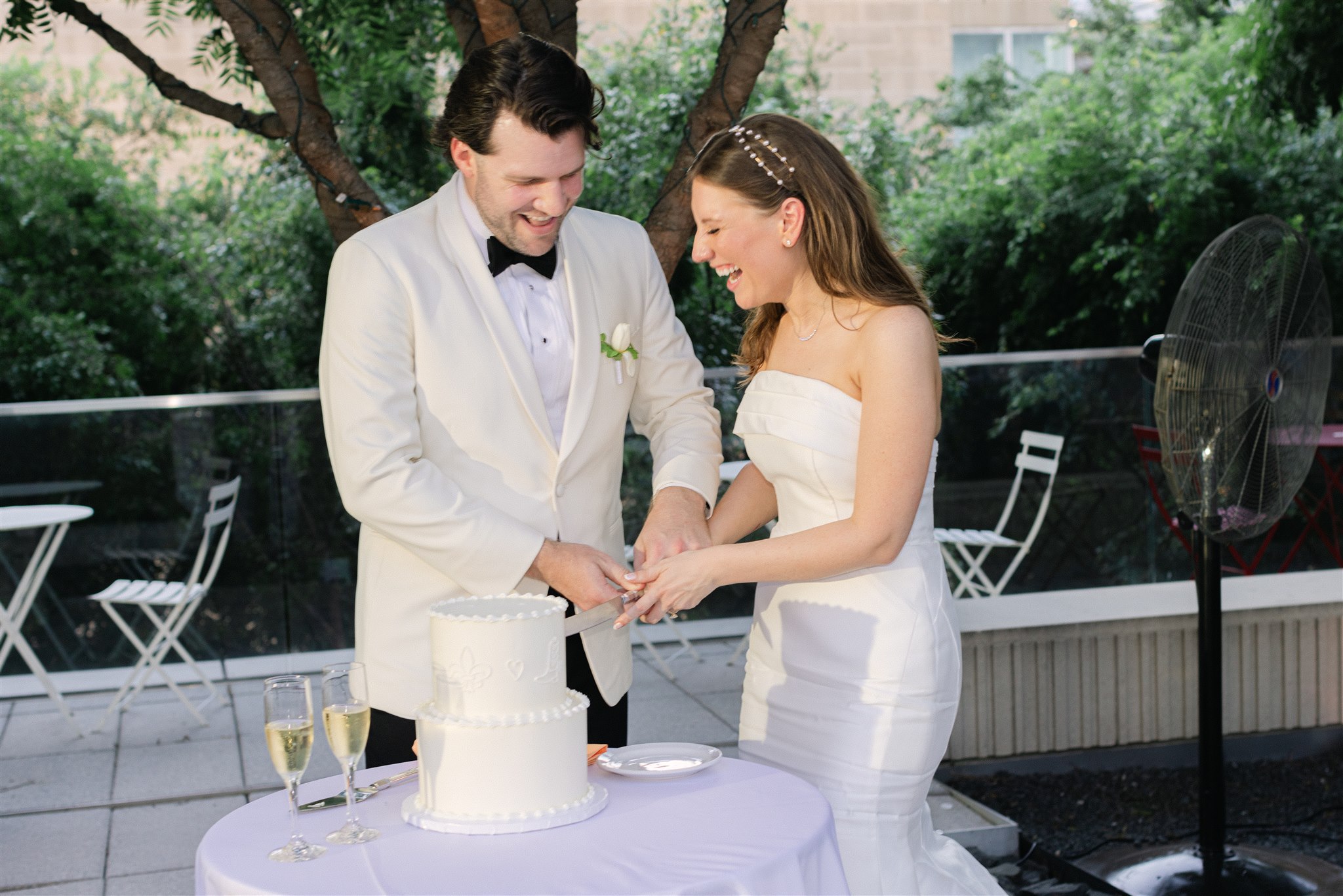 bride and groom cutting the cake