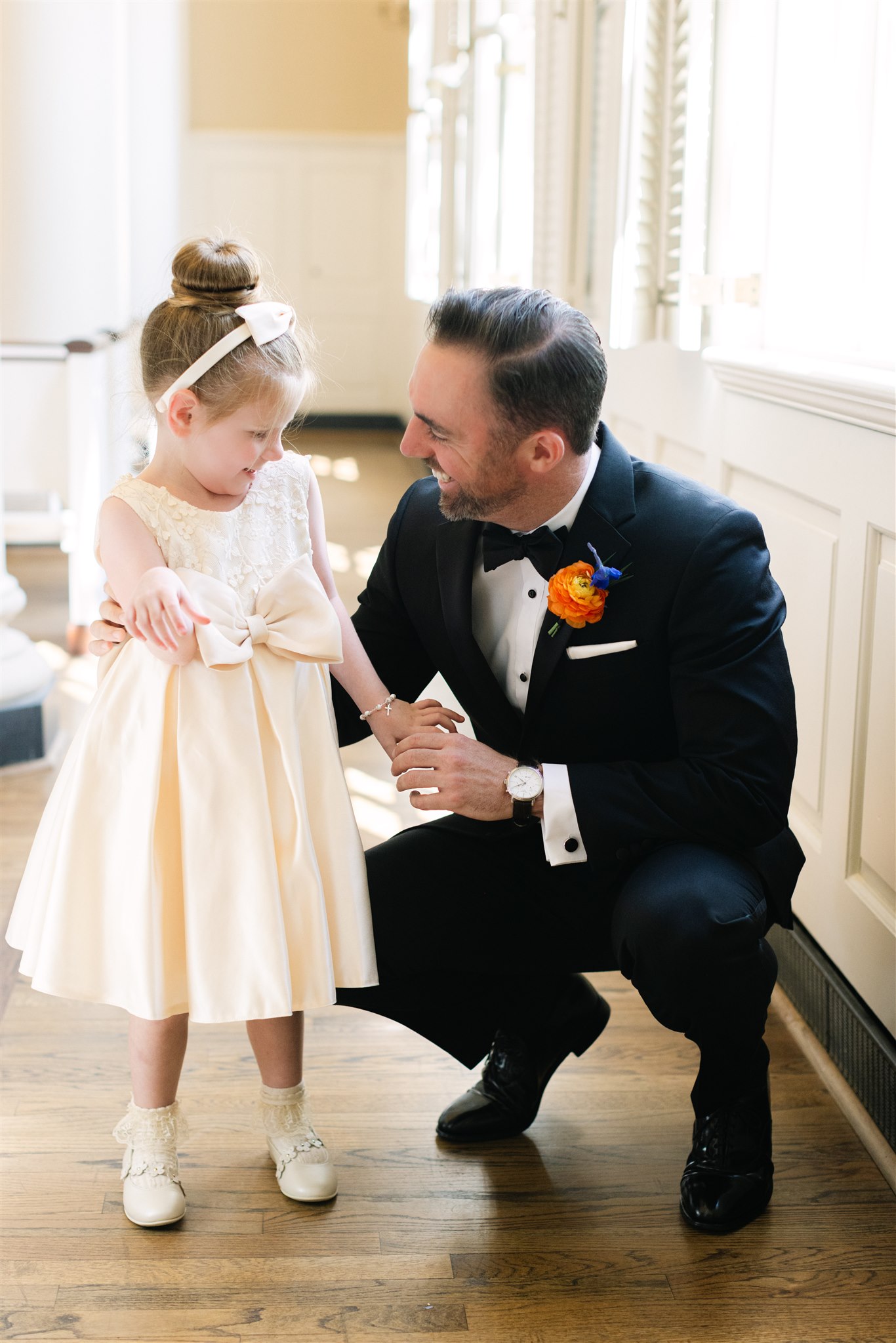 groom with his niece before his wedding ceremony in Dallas Texas