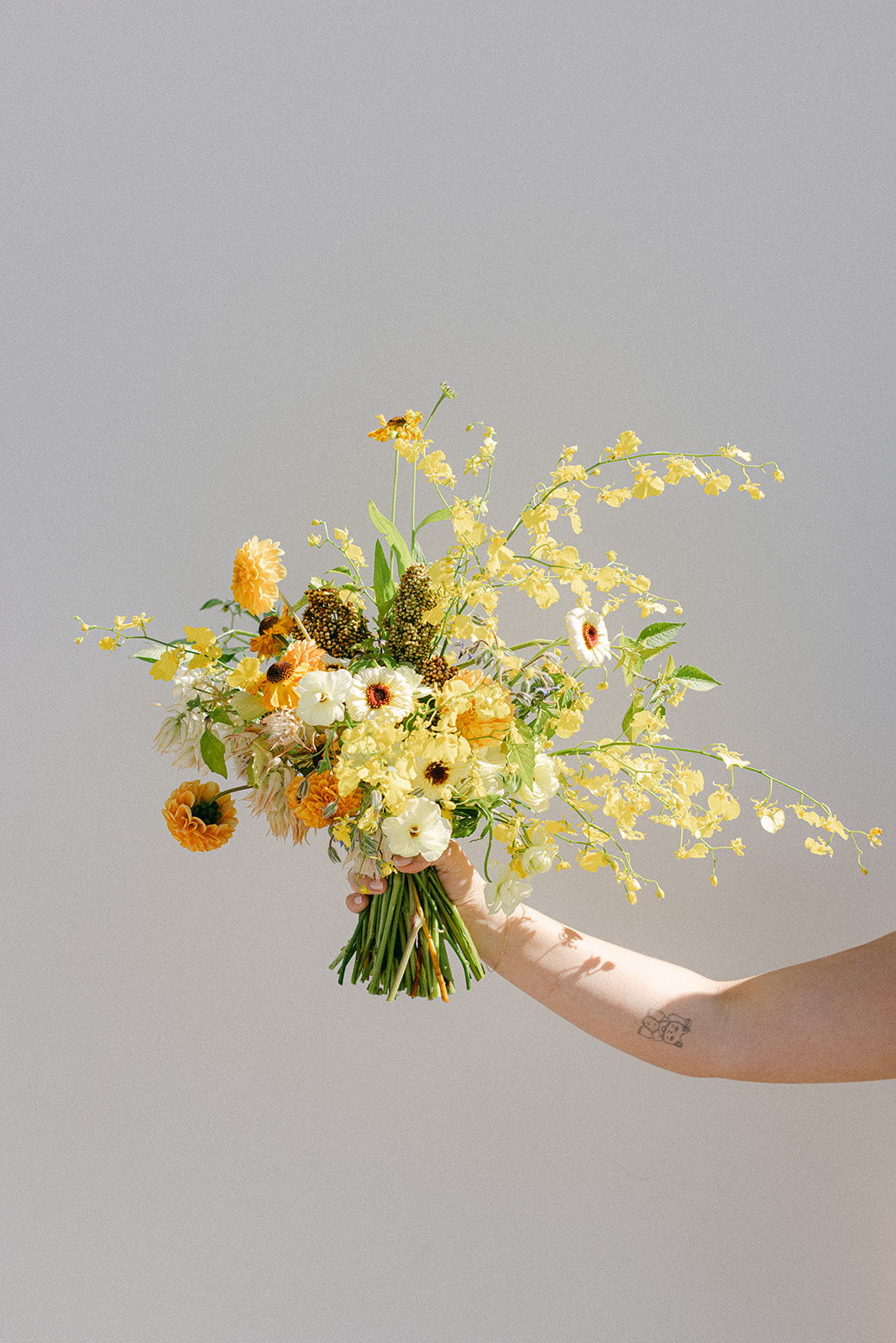 yellow flower bouquet for a European inspired elopement