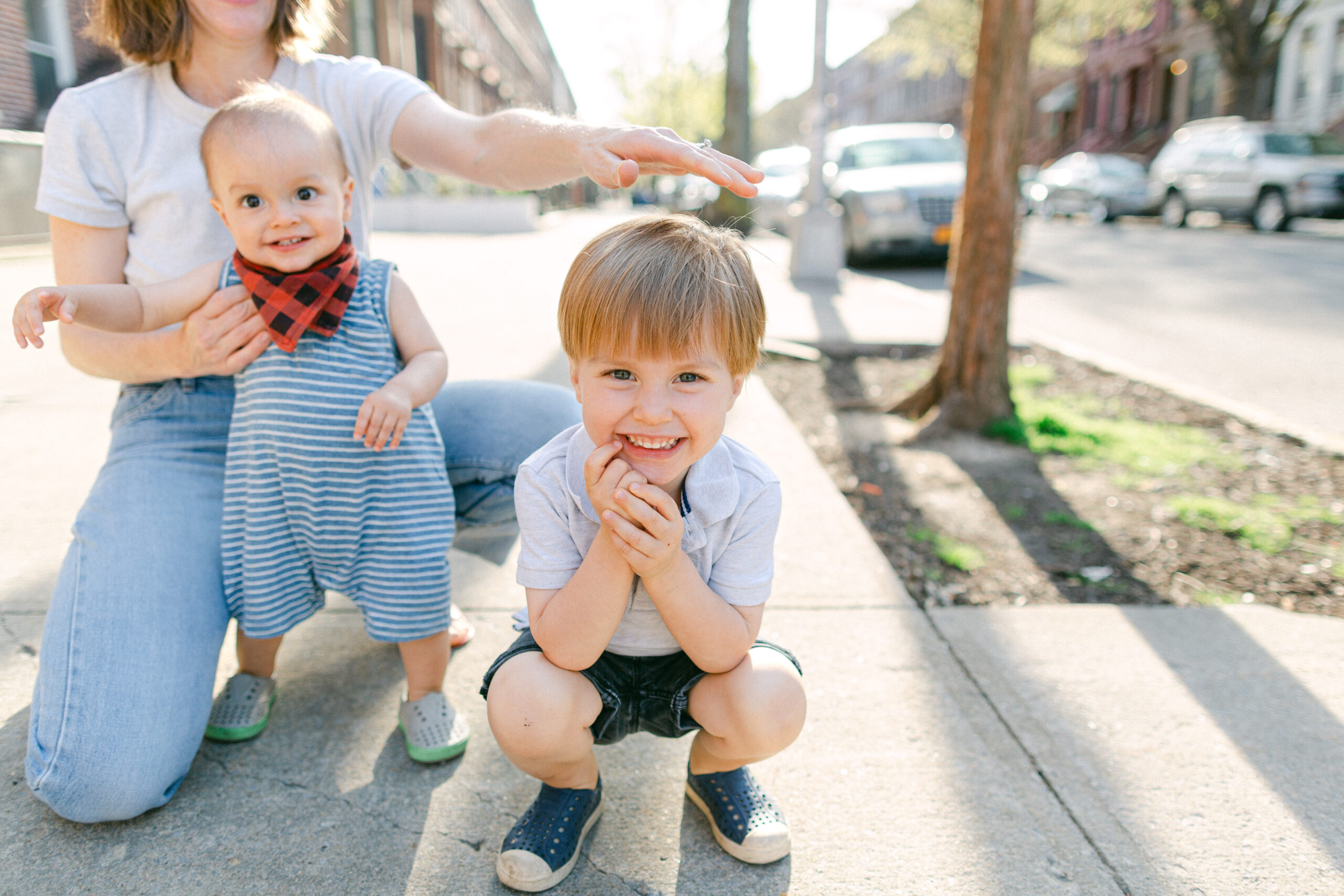 Little kids smiling at the camera