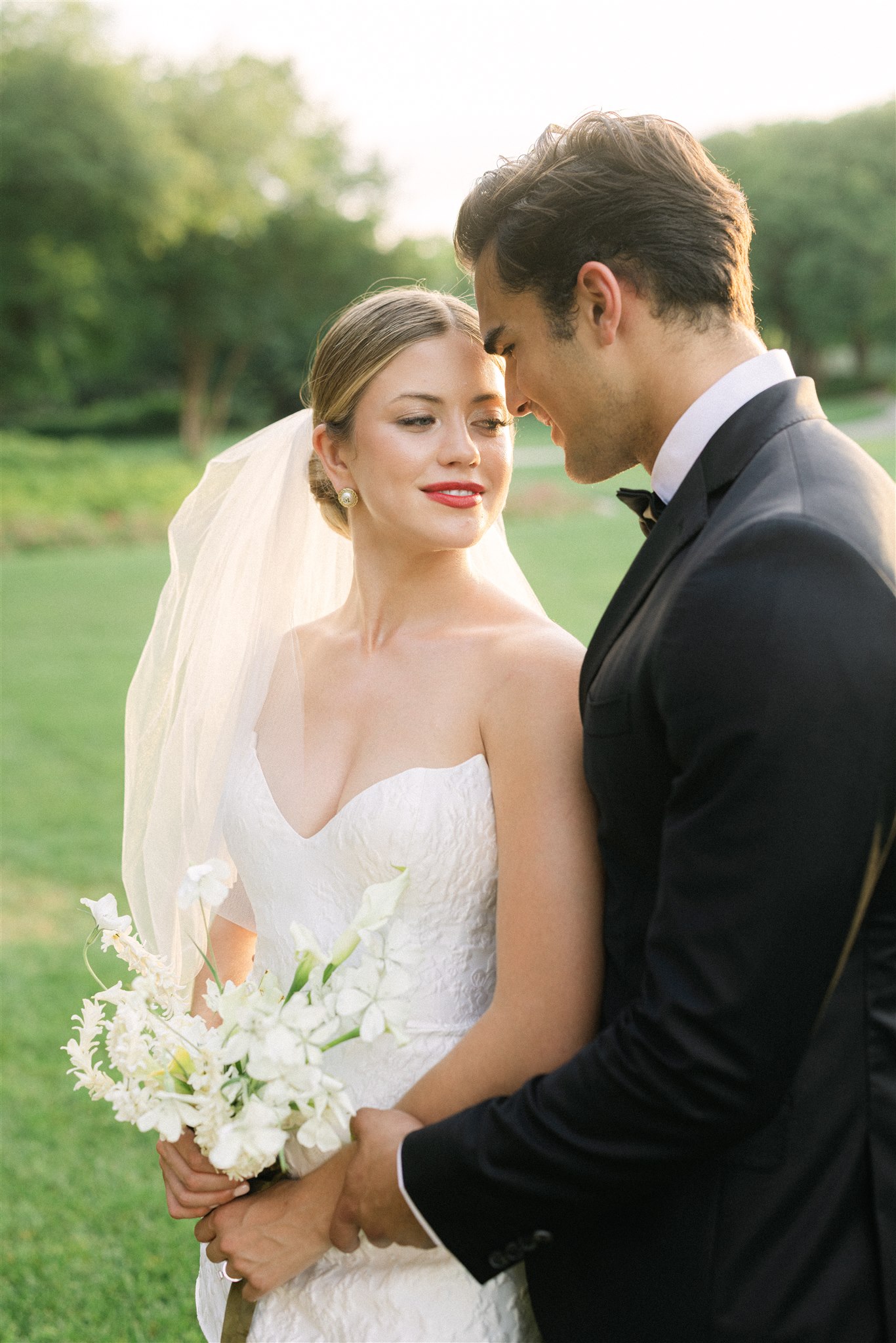 Bride and groom golden hour portraits during a wedding reception