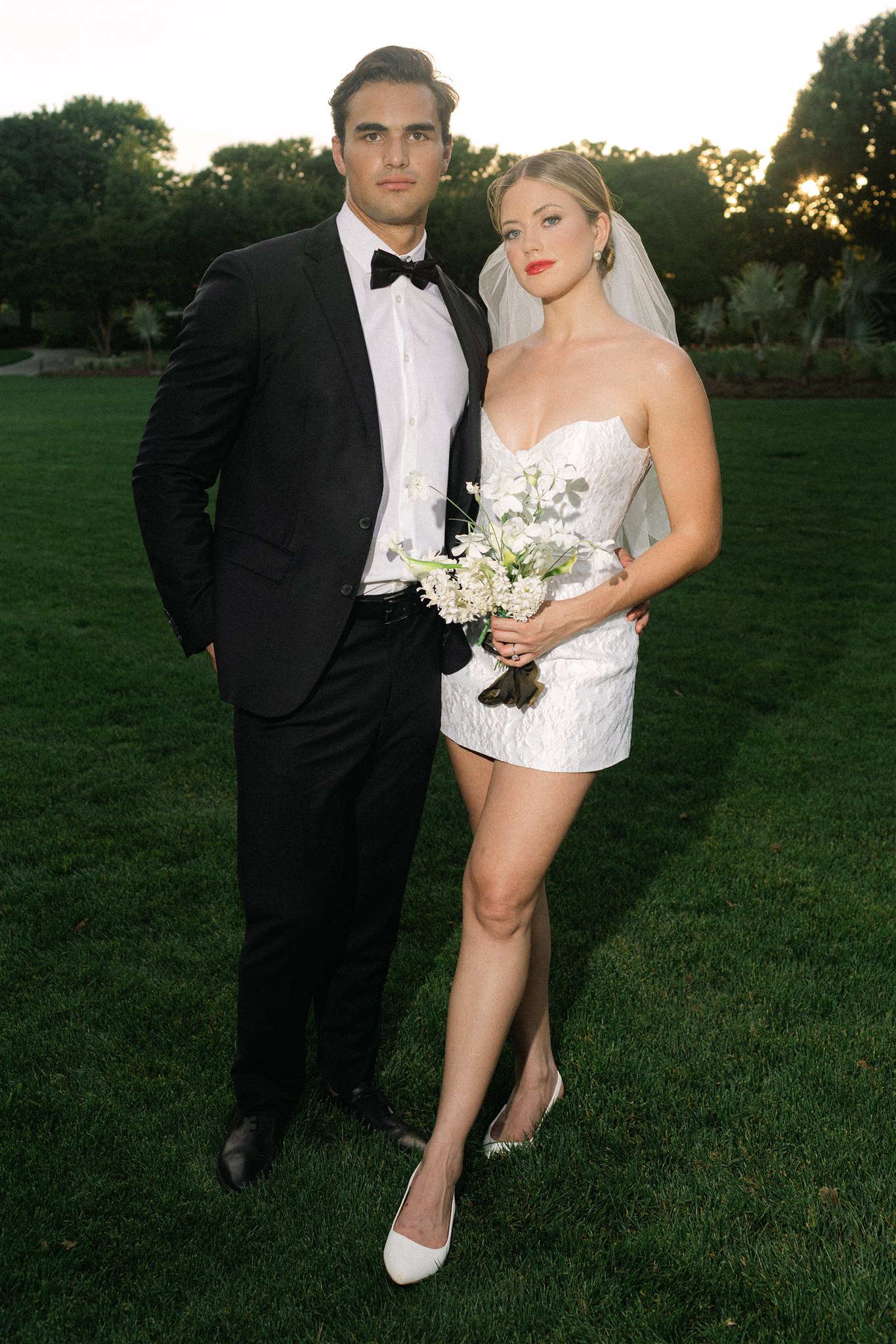 Bride and groom golden hour portraits during a wedding reception