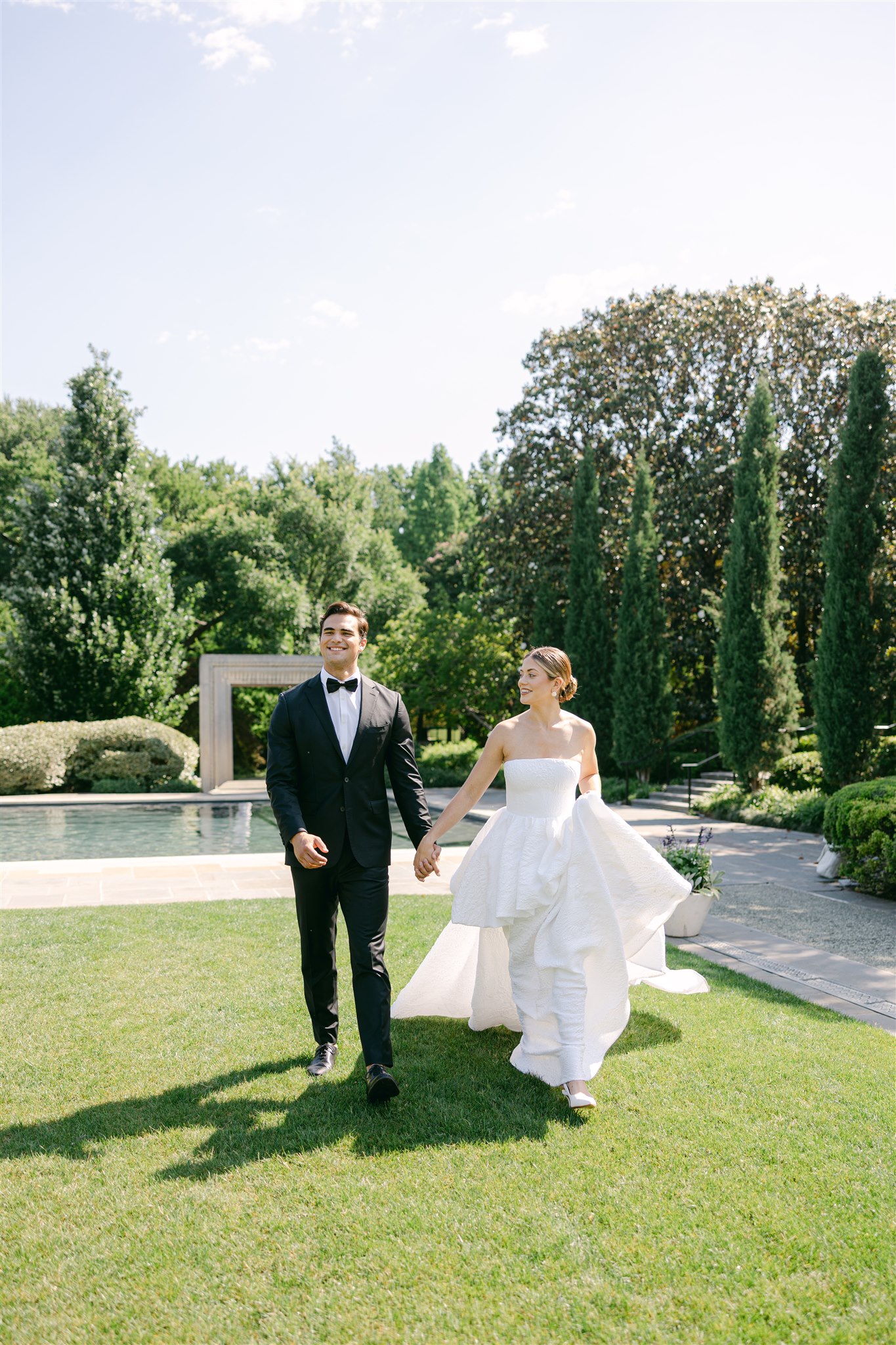 wedding couple portraits in the womens garden at the dallas arboretum