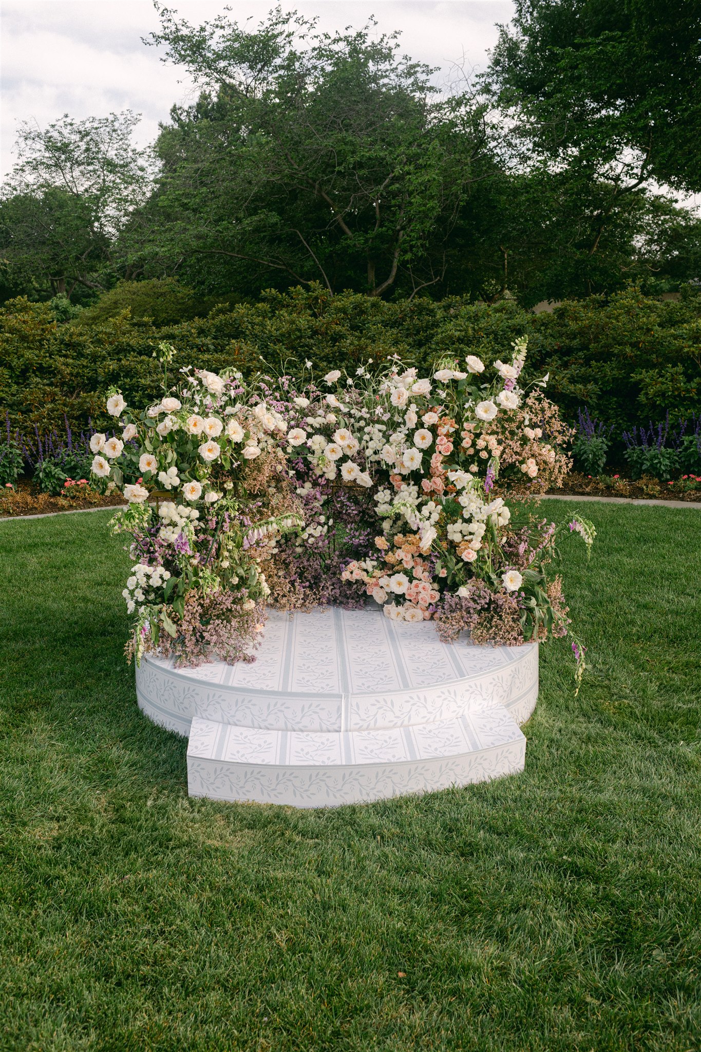 a modern wedding ceremony floral arrangement
