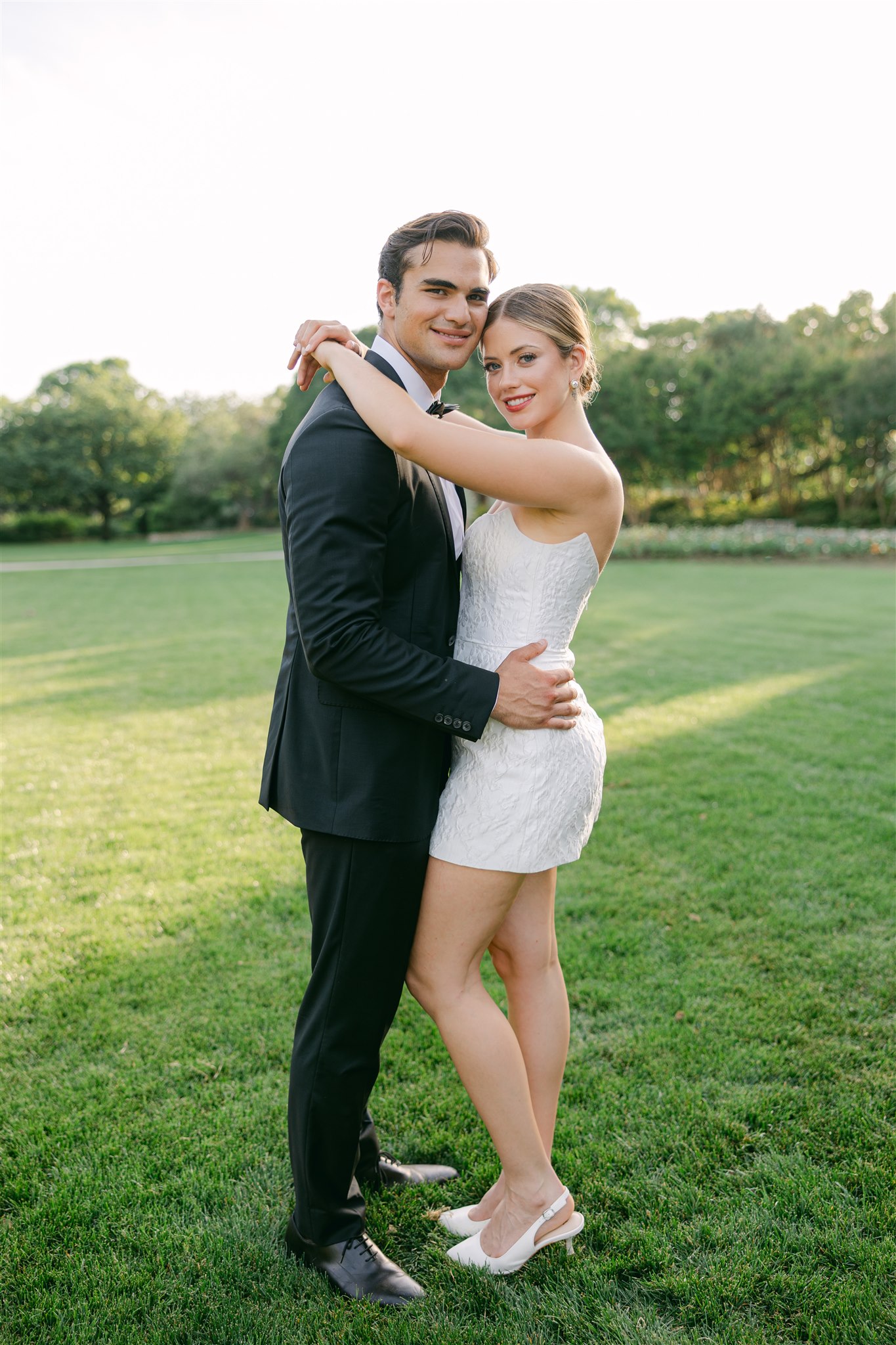 Bride and groom golden hour portraits during a wedding reception