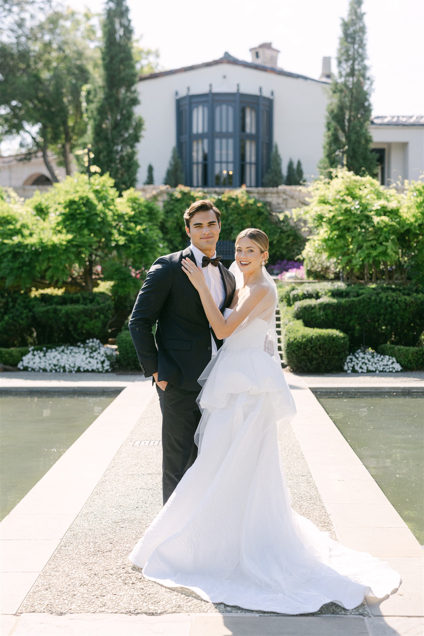 wedding couple portraits in the womens garden at the dallas arboretum