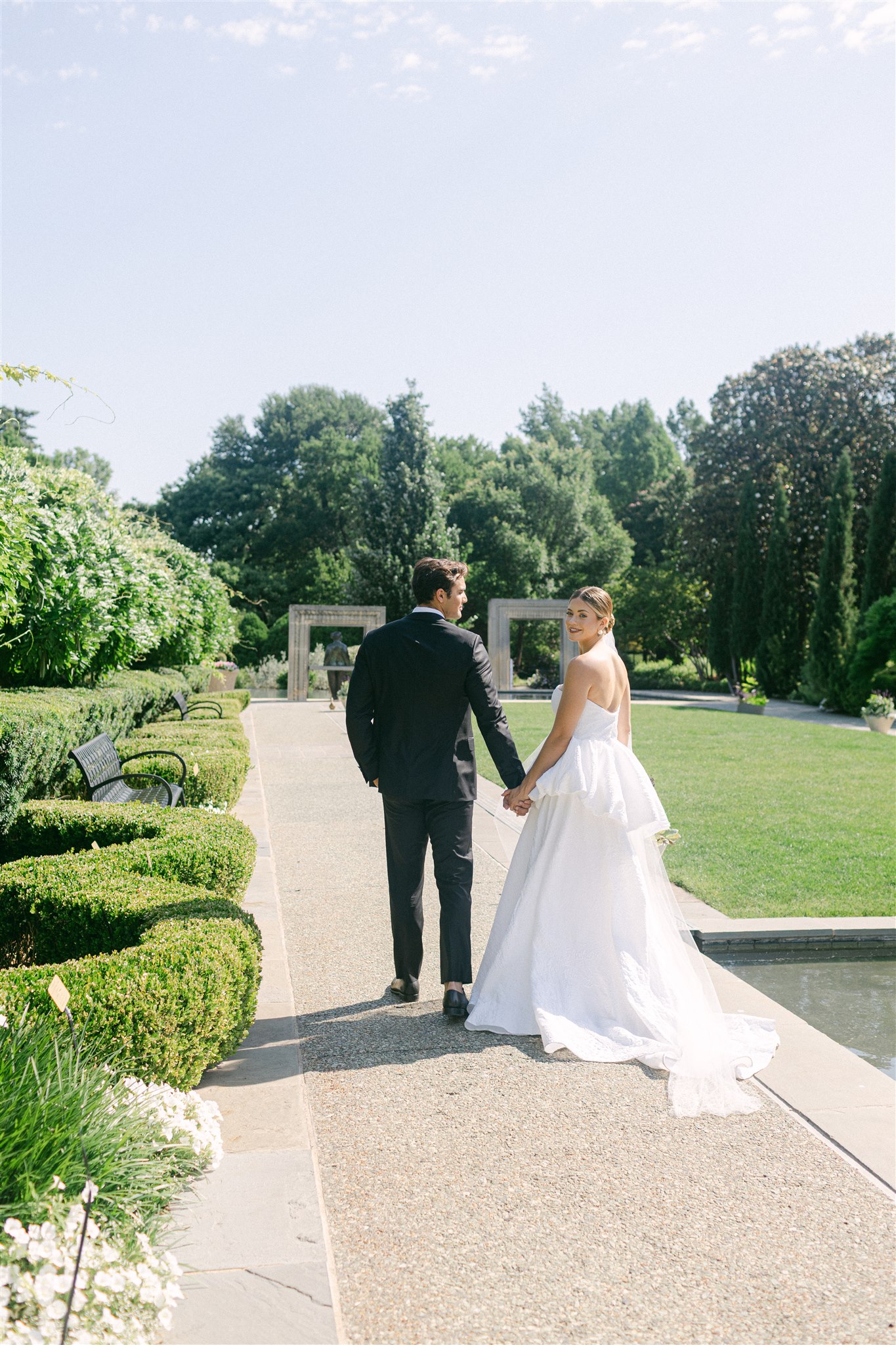 wedding couple portraits in the womens garden at the dallas arboretum