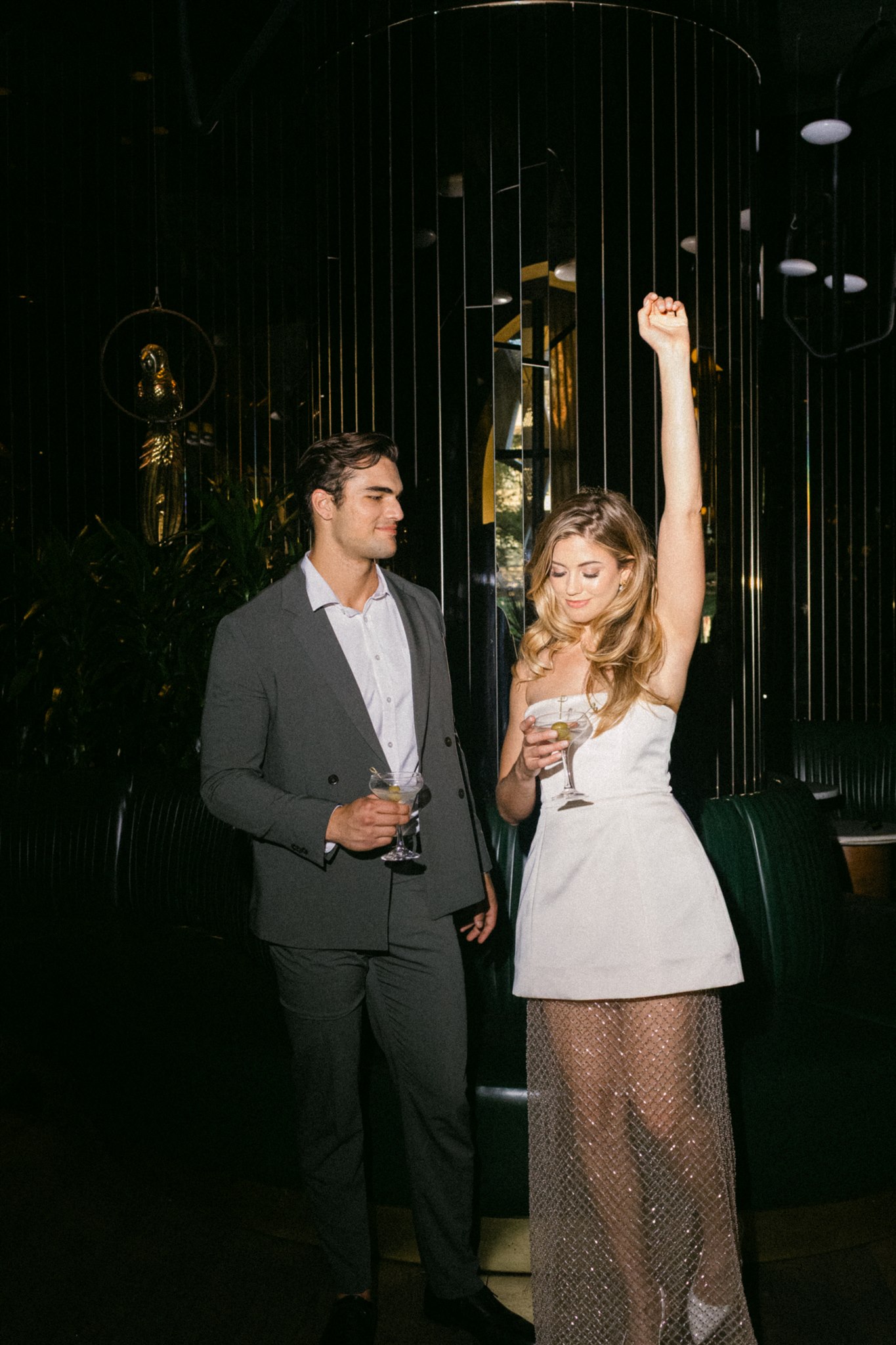 Moody editorial couples photos at a rehearsal dinner at the virgin hotels dallas