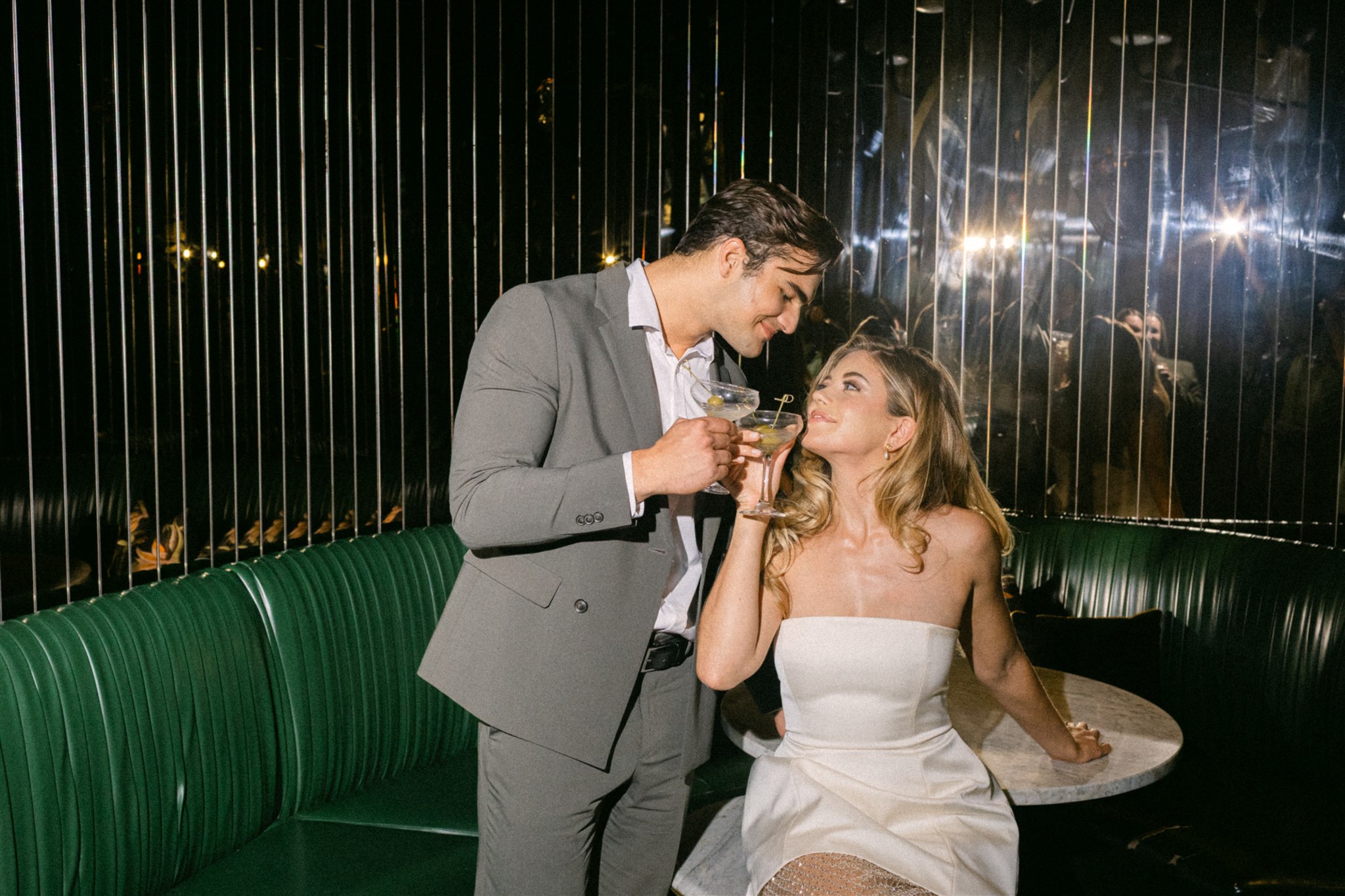 Moody editorial couples photos at a rehearsal dinner at the virgin hotels dallas