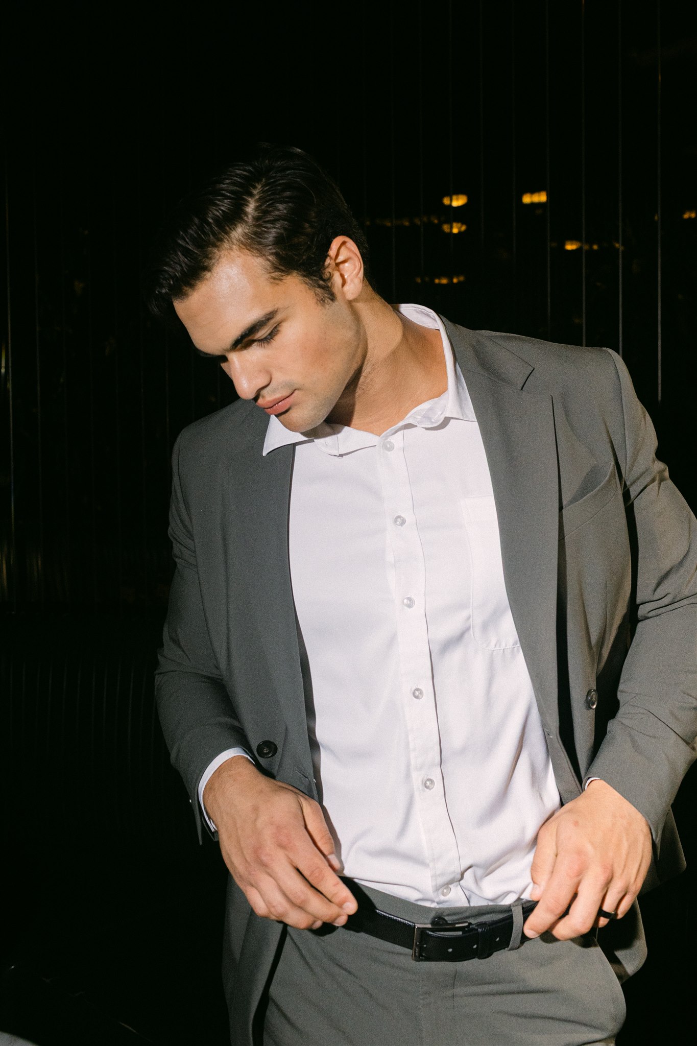 a groom at his rehearsal dinner at virgin hotels dallas