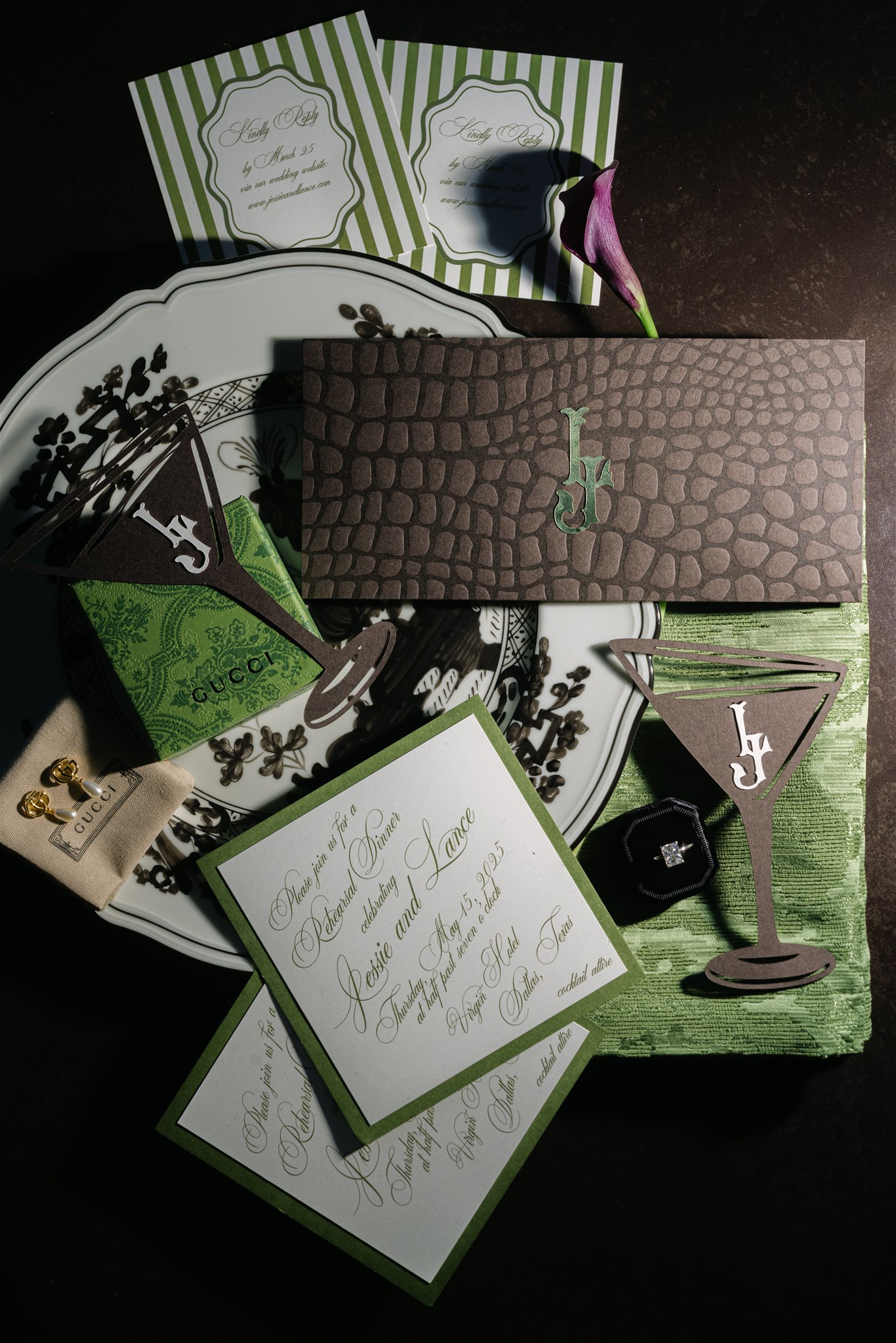 Moody wedding invitation suite for a featuring gucci earrings and green, maroon and brown accent colors