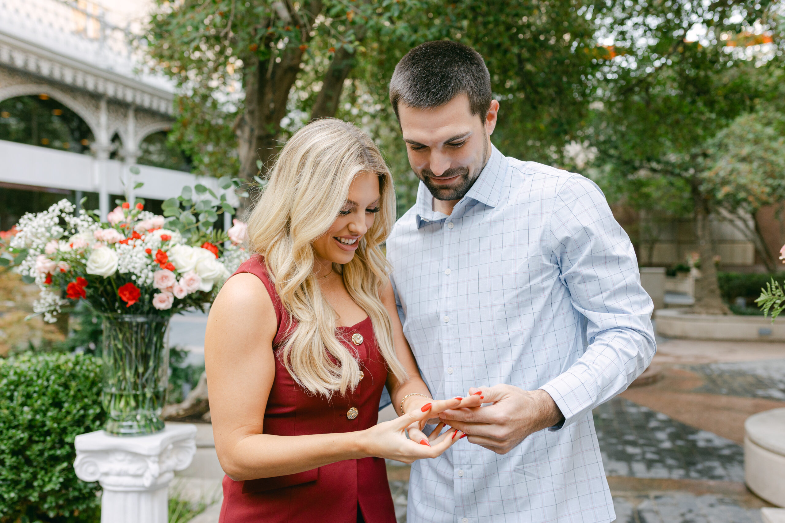 a girl admiring her new engagement ring