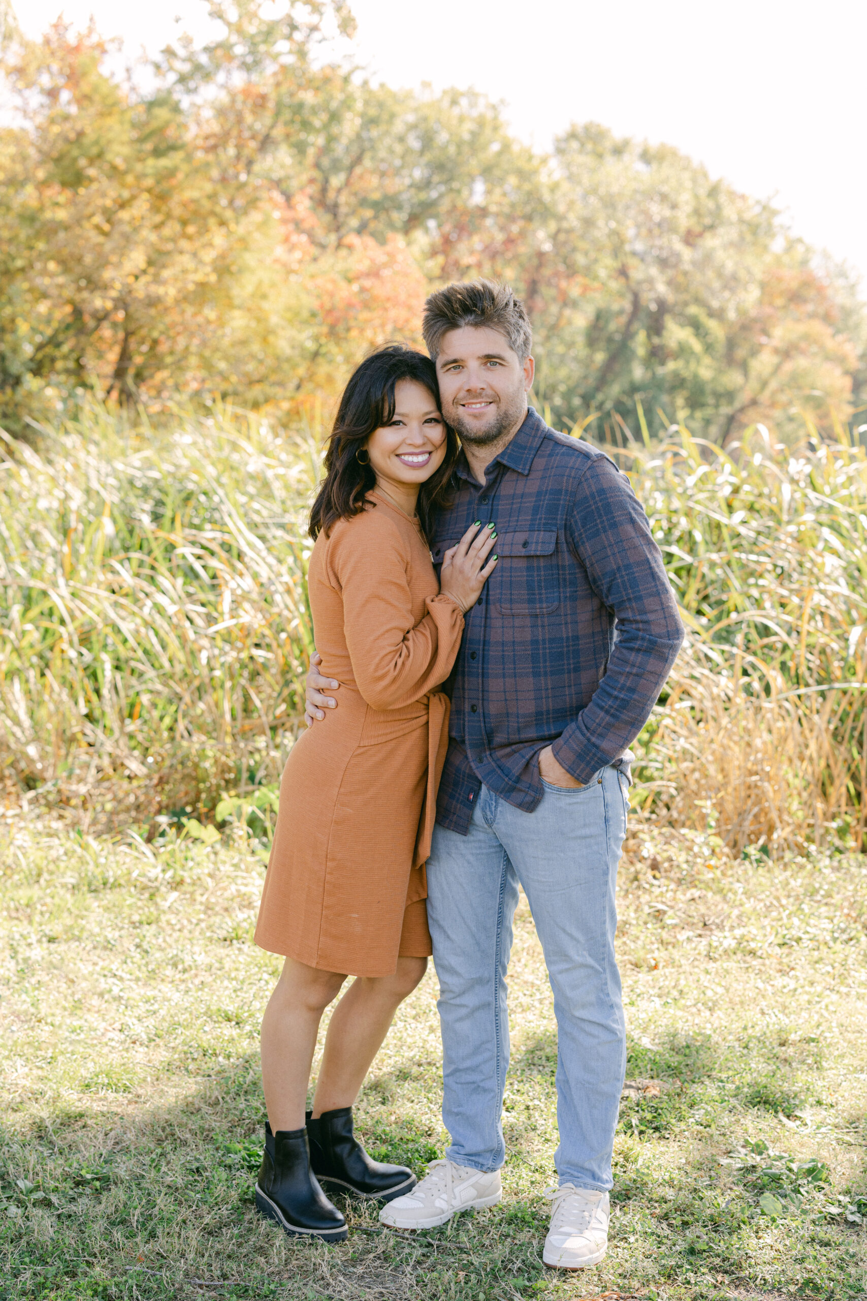 a man and woman embracing at white rock lake for couples photos