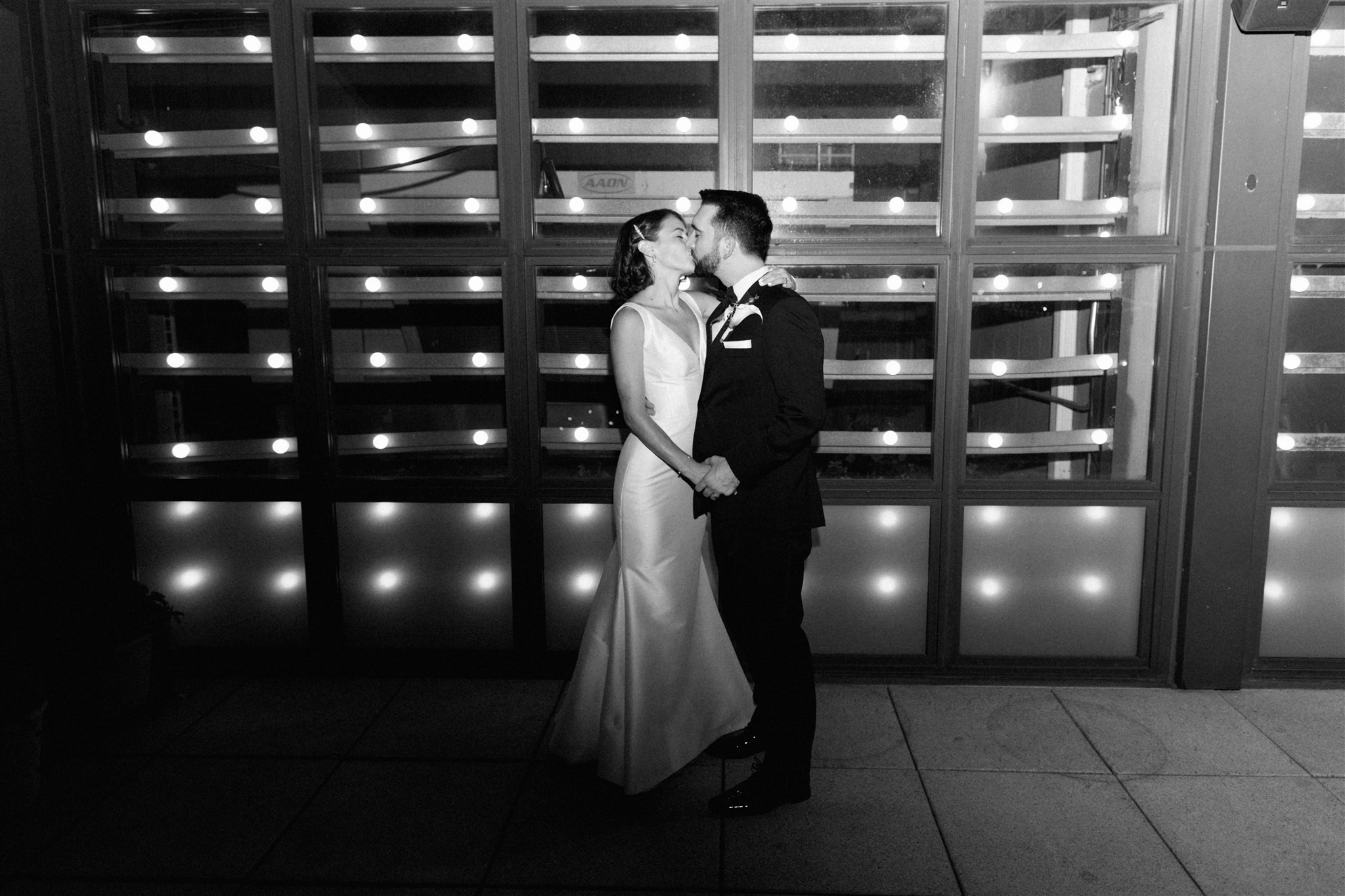 bride and groom kissing