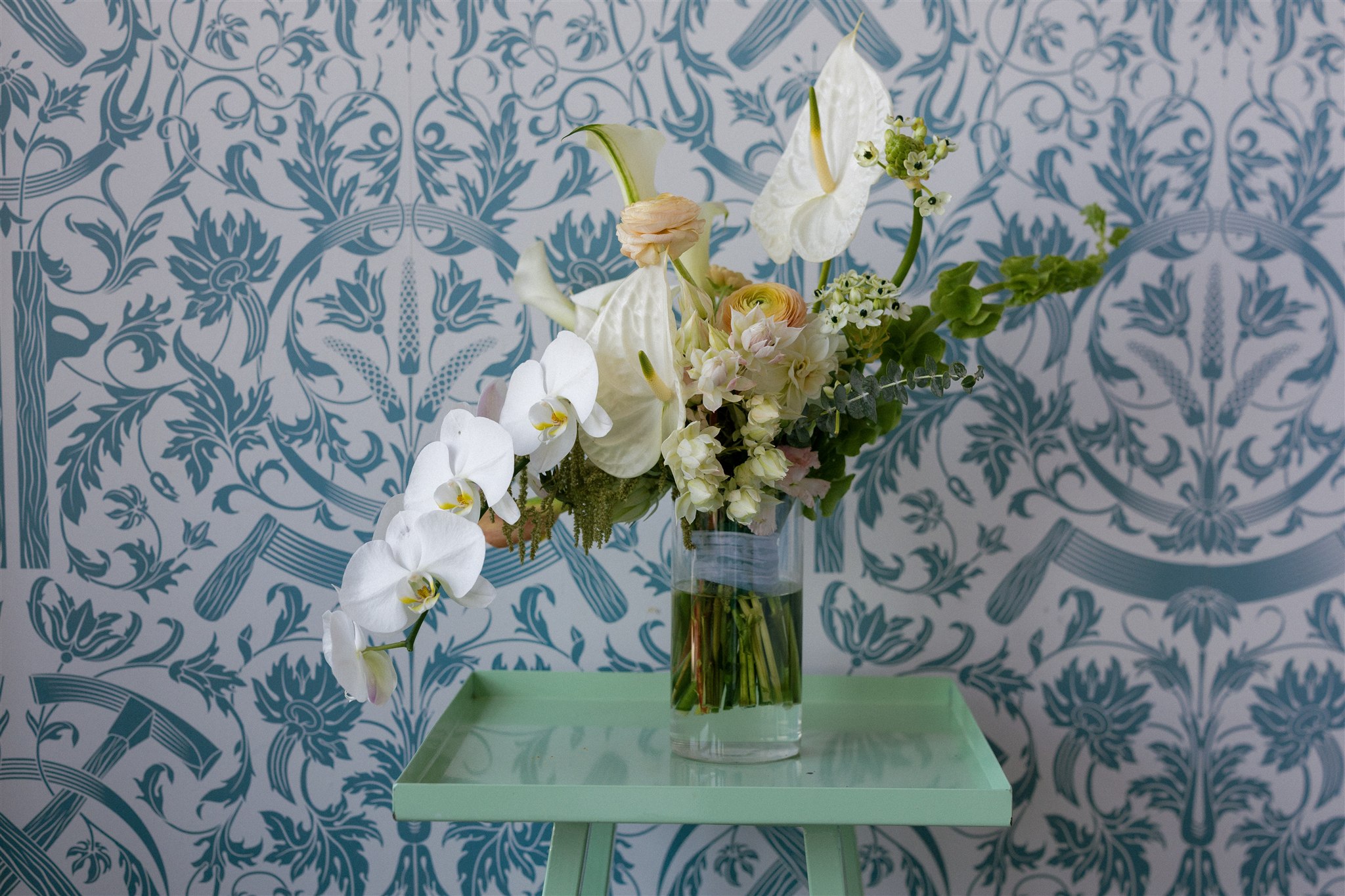 a bridal bouquet of orchids and other whimsical flowers