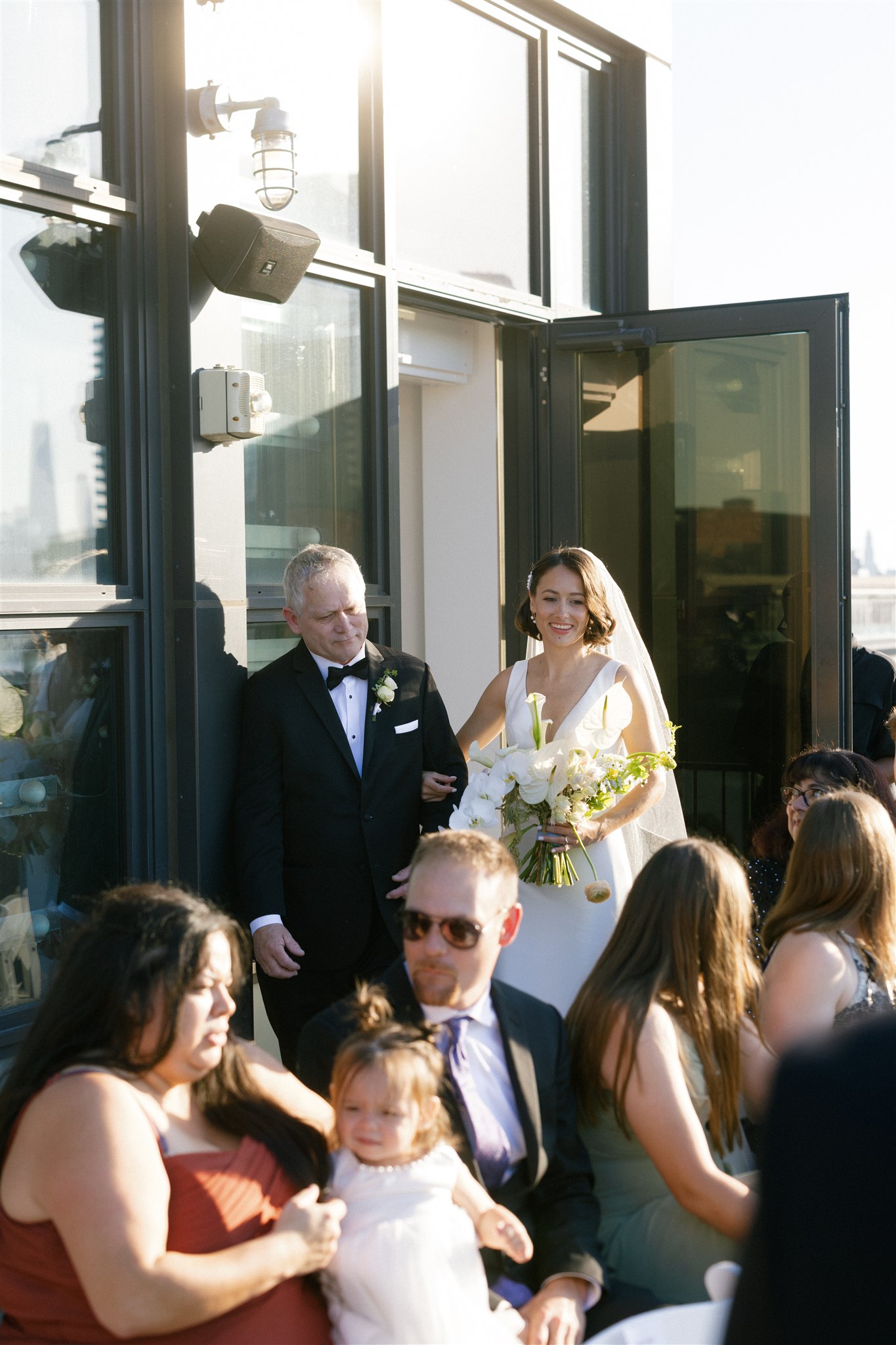 a rooftop wedding ceremony at the wythe hotel in brooklyn nyc