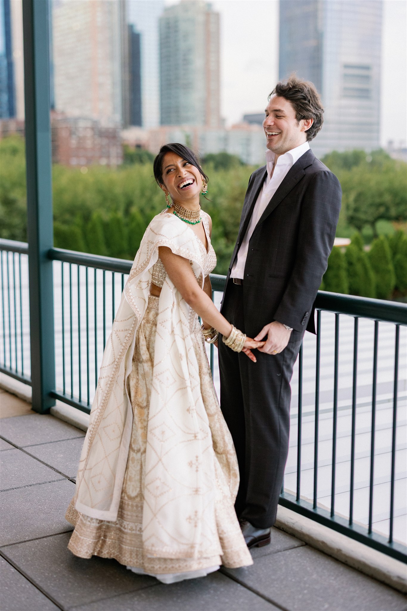 Bride and groom outfit change for their Indian fusion wedding reception