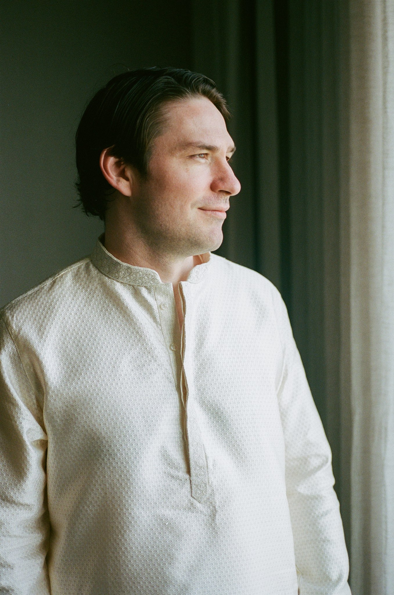 A groom getting ready for his wedding day