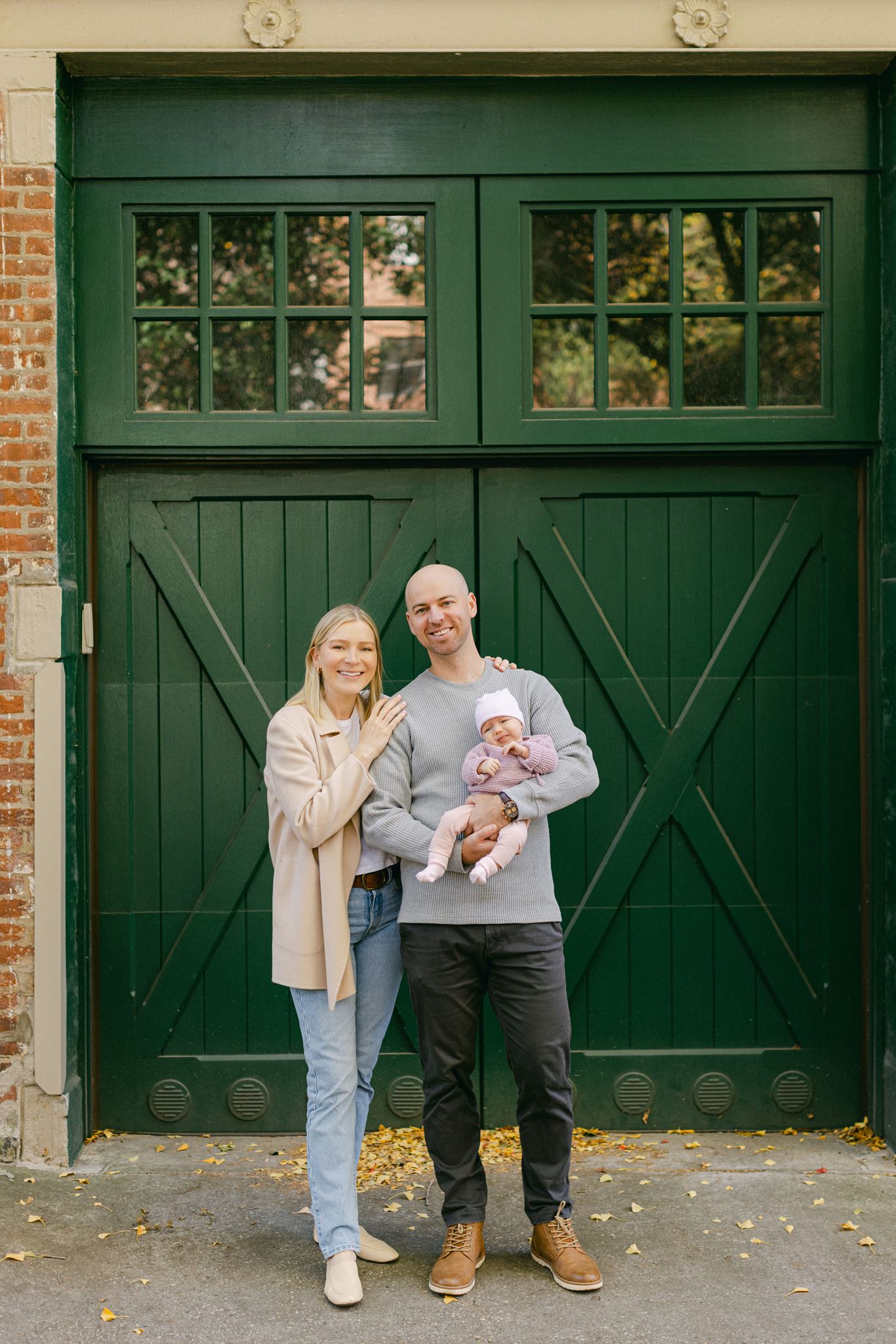 Cobble Hill Family photo of a family in front of green doors