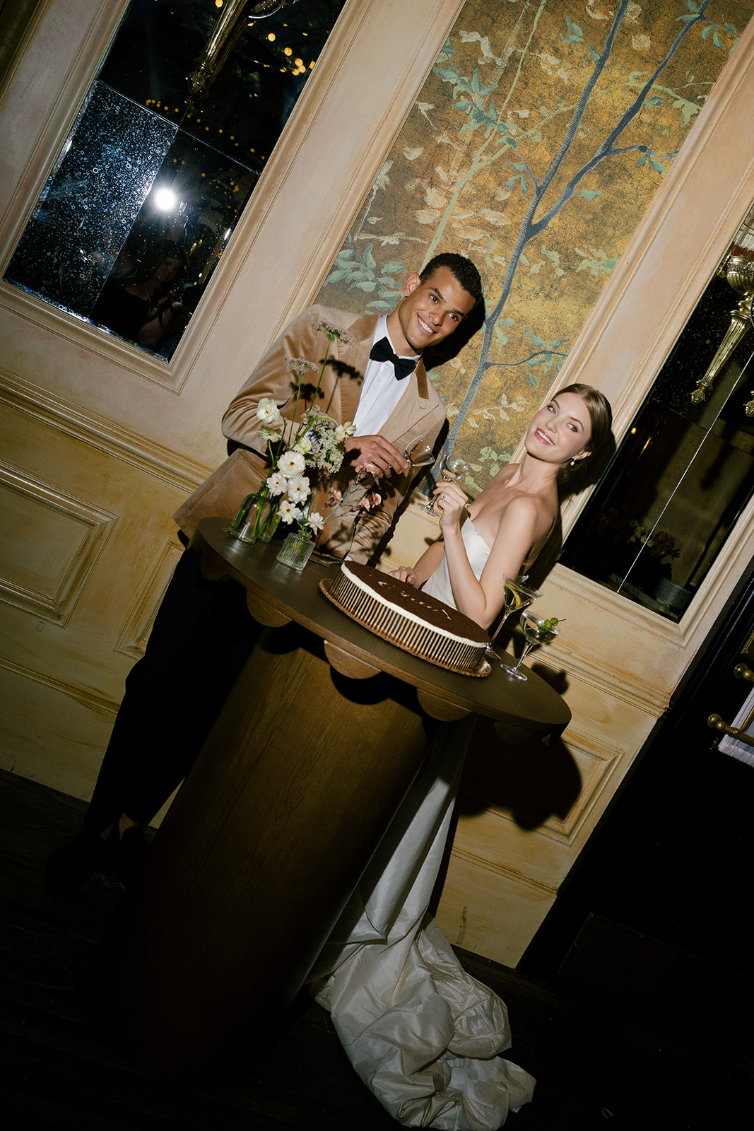 Cake cutting during a wedding at Hotel Chelsea in NYC