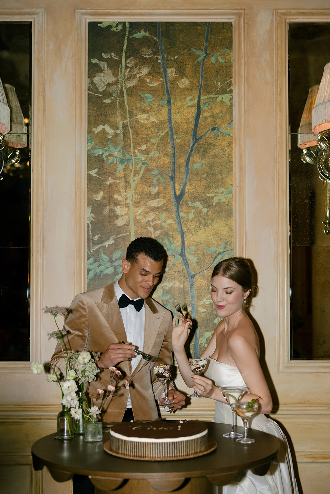 Cake cutting during a wedding at Hotel Chelsea in NYC