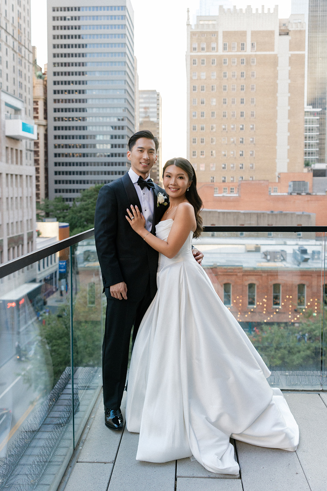 wedding couple portraits in downtown dallas at the mirador restaurant on the balcony