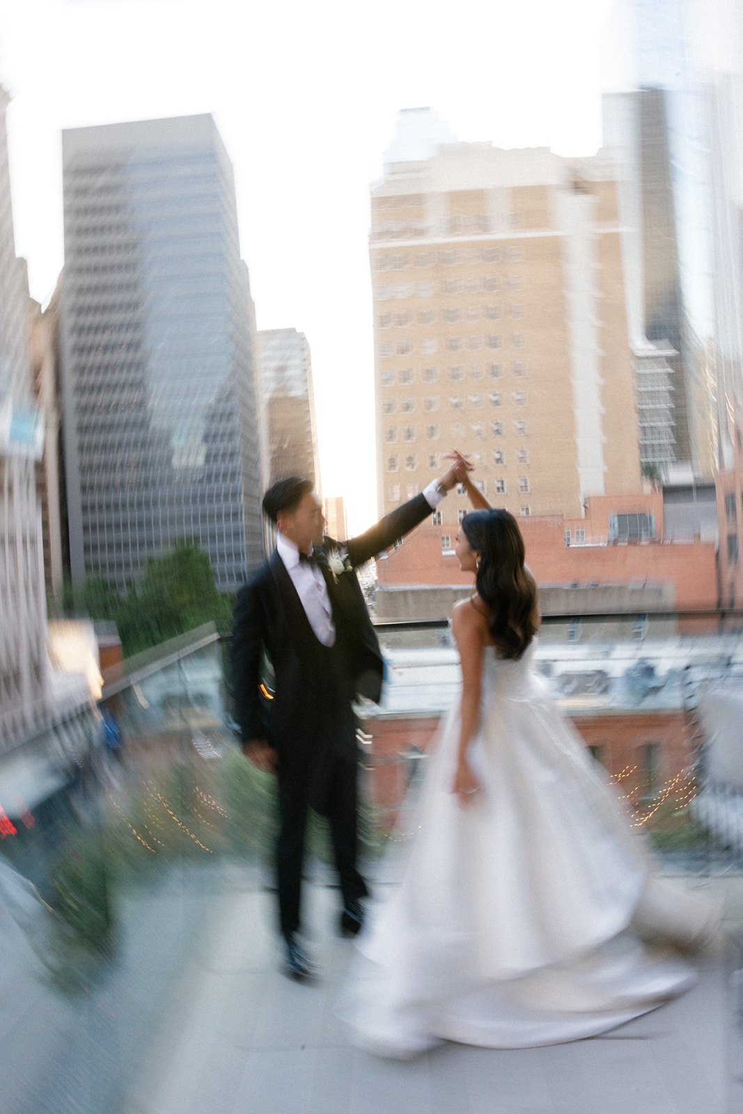 wedding couple portraits in downtown dallas at the mirador restaurant on the balcony