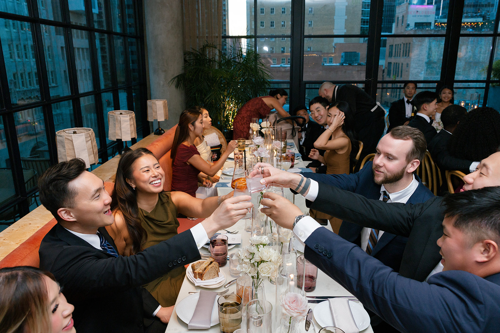 wedding guests toasting